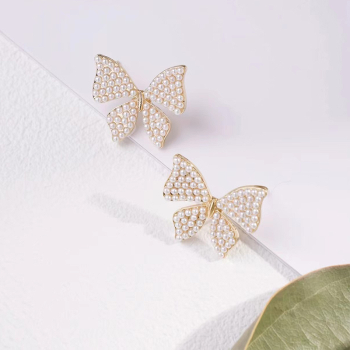 Pearl and Bow Stud Earrings